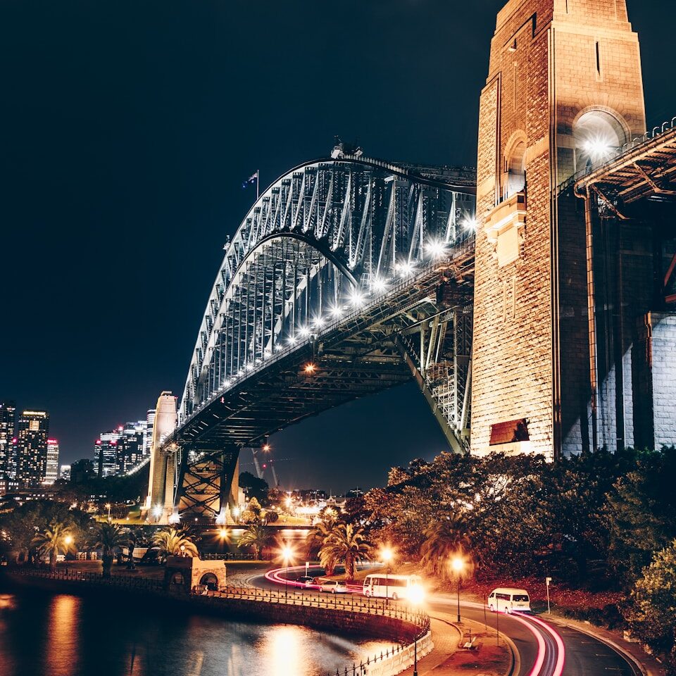 black and brown concrete bridge during night time