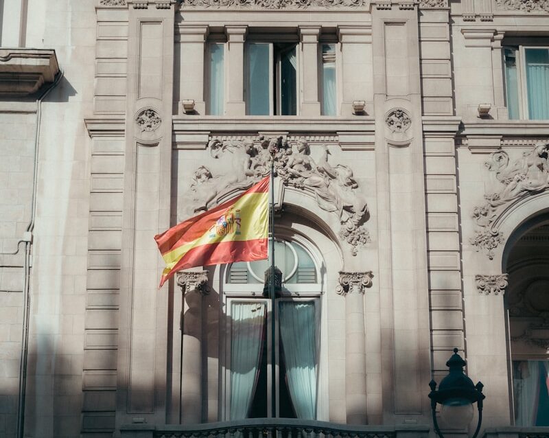 a large building with a flag on top of it