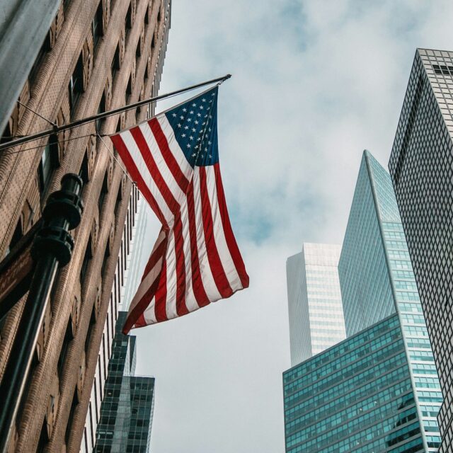 Photo by Nik Shuliahin 💛💙 low angle photo of flag of U.S.A